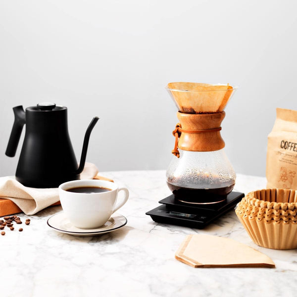 cup of coffee, drip coffee machine, unbleached coffee filters, public goods ground coffee