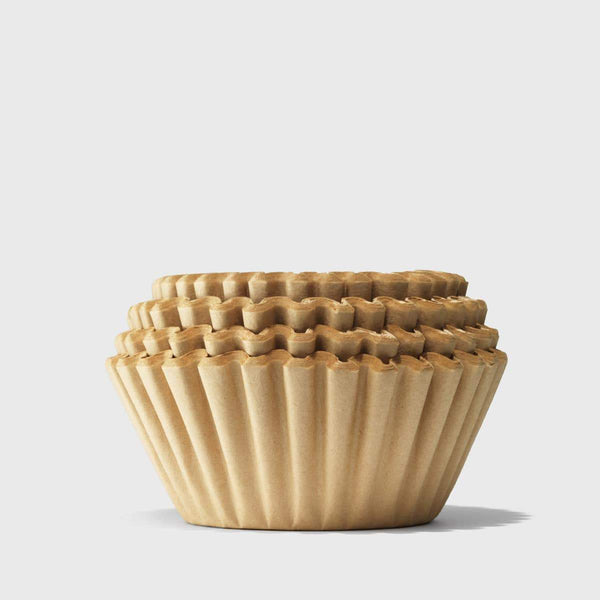 stack of unbleached coffee filter baskets