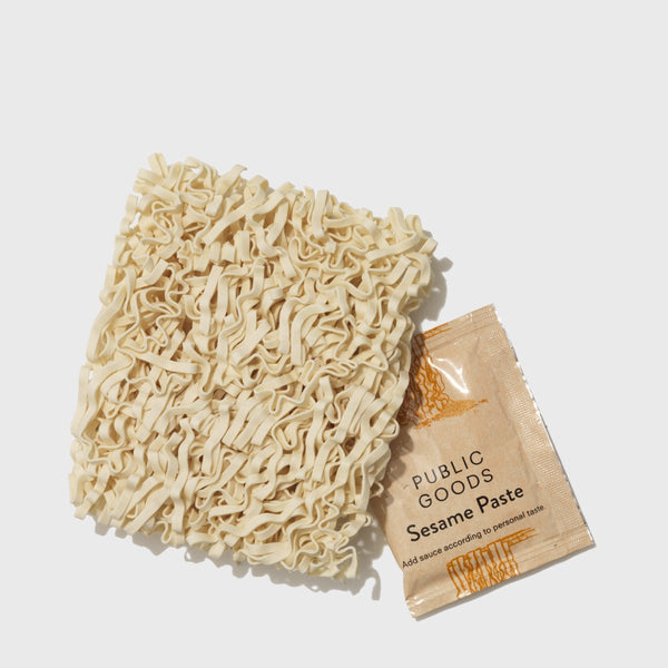 uncooked ramen noodles, sesame paste flavor packet