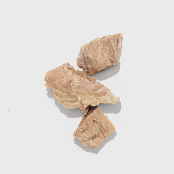 three chunks of canned skipjack tuna fish
