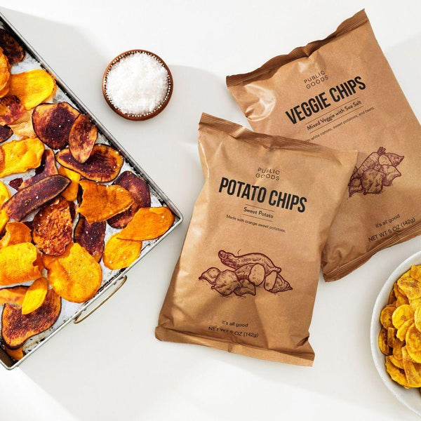 pan with crispy veggie chips, bag of public goods potato chips, bag of public goods veggie chips, salt
