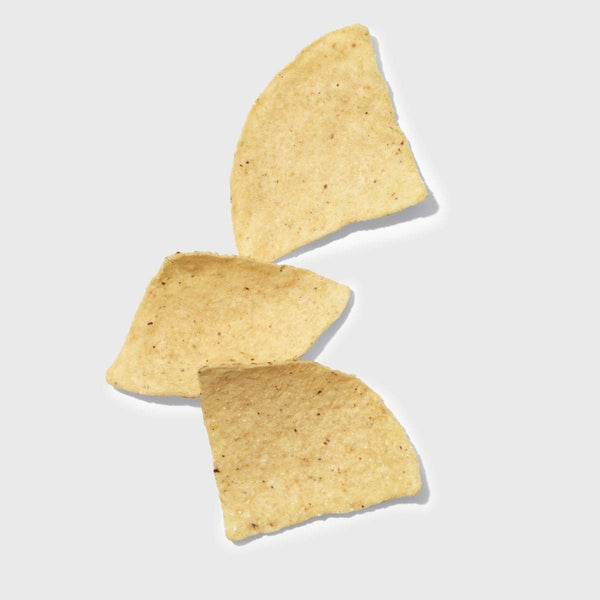 three white corn tortilla chips